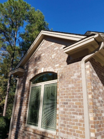 side view of house showing gutter installation